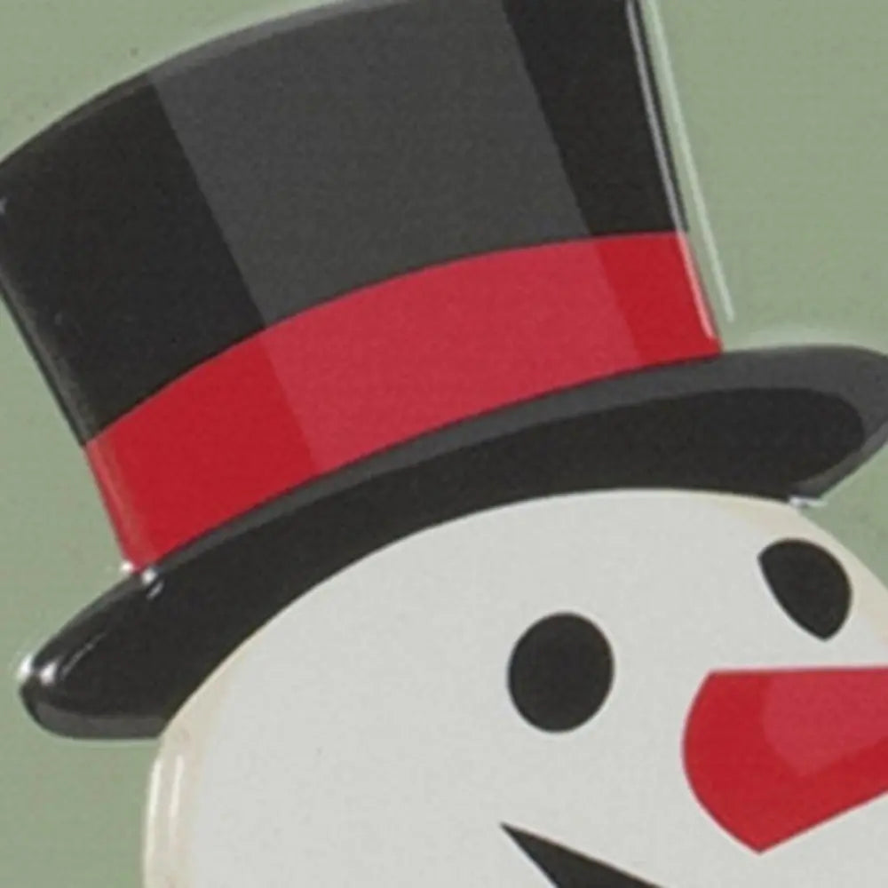 16" X 9" Green And White Metal Christmas Snowman Hanging Wall Decor - NOBLE HOME INTERIORS