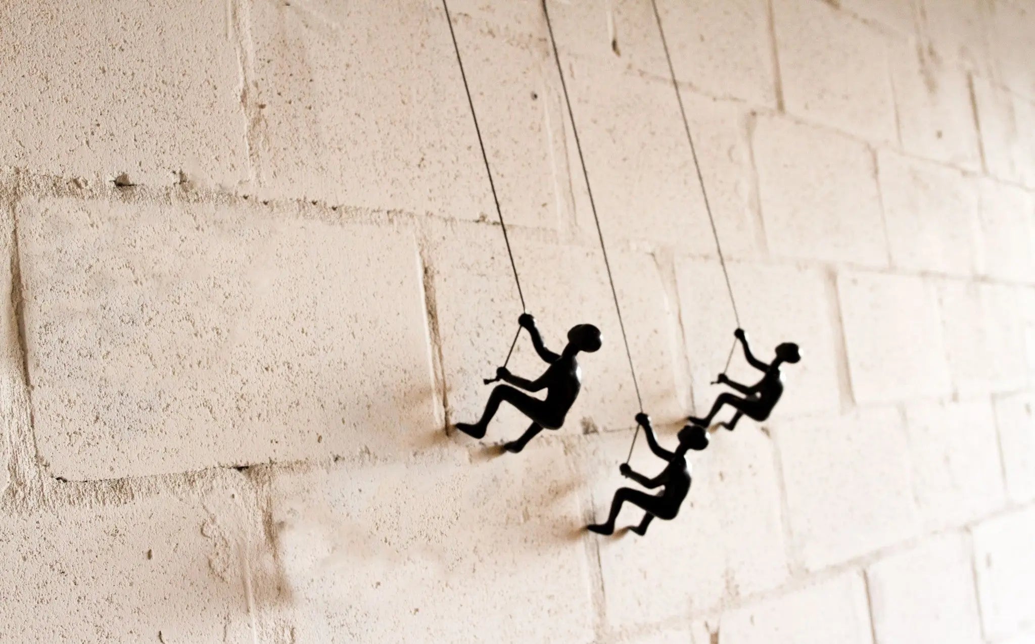 Set of Three Black Resin Climbing Man Hanging Dimensional Sculpture HomeRoots