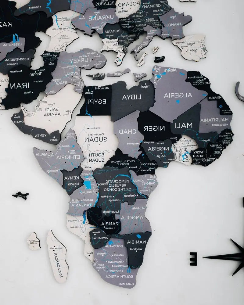 35" X 59" Black Gray and White Wood World Map Hanging Dimensional Sculpture - NOBLE HOME INTERIORS