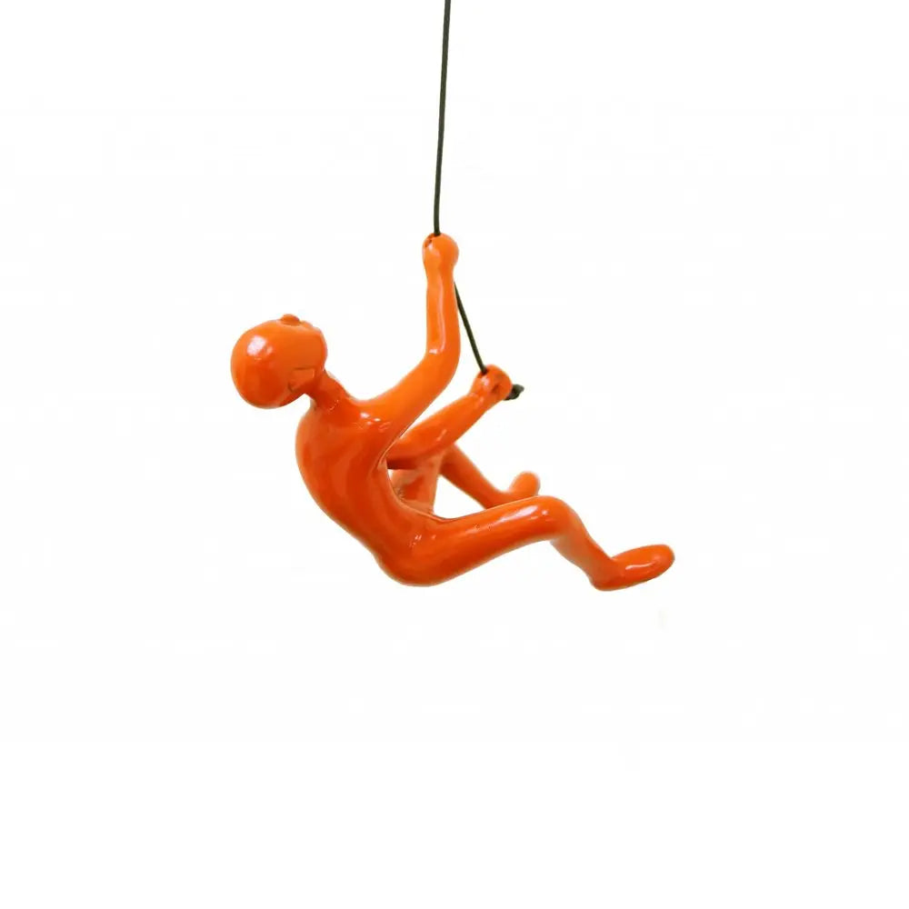 6" X 3" Orange Resin Climbing Man Hanging Dimensional Sculpture HomeRoots