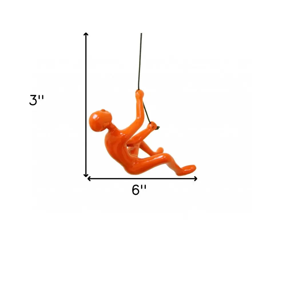 6" X 3" Orange Resin Climbing Man Hanging Dimensional Sculpture HomeRoots