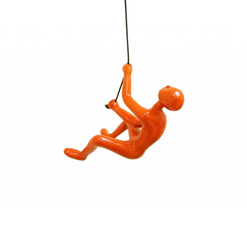 6" X 3" Orange Resin Climbing Man Hanging Dimensional Sculpture HomeRoots