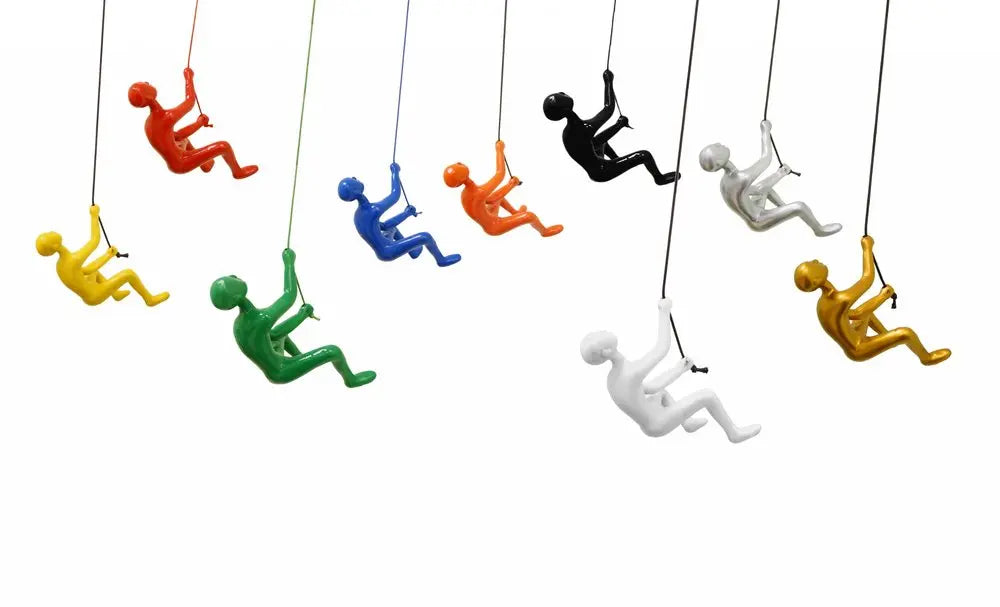 Set of Nine Rainbow Resin Climbing Man Hanging Dimensional Sculpture HomeRoots