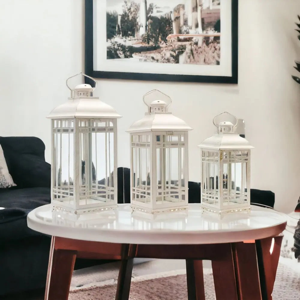 Set of Three Ivory Metal Mirrored Floor Lantern Candle Holders HomeRoots