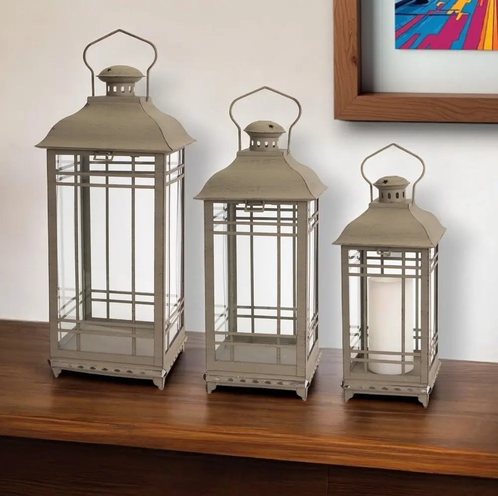 Set of Three Brown Distressed Geometric Glass And Metal Floor Lantern Candle Holders HomeRoots