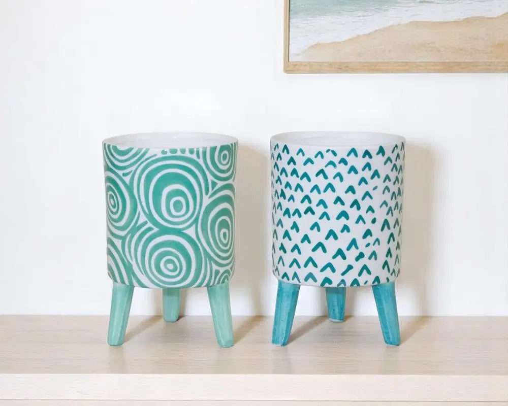 Set of Two Aqua Teal And White Ceramic 2 Ounce Chevron Round Distressed Pot Planters HomeRoots