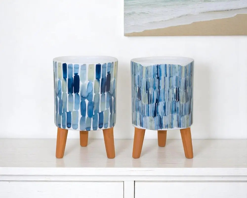 Set of Two Blue Terra Cotta And White Ceramic 2 Ounce Round Raised Pot Planters HomeRoots