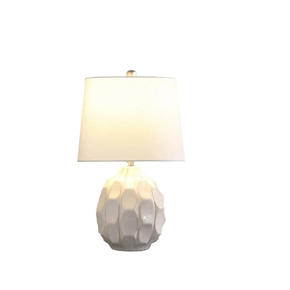 22" Cream Ceramic Faceted Table Lamp With Off White Drum Shade HomeRoots