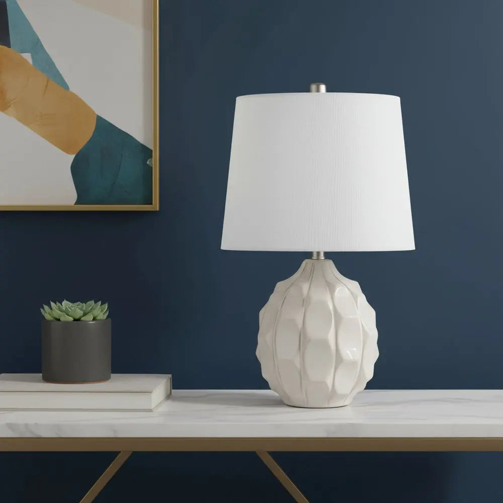 22" Cream Ceramic Faceted Table Lamp With Off White Drum Shade HomeRoots