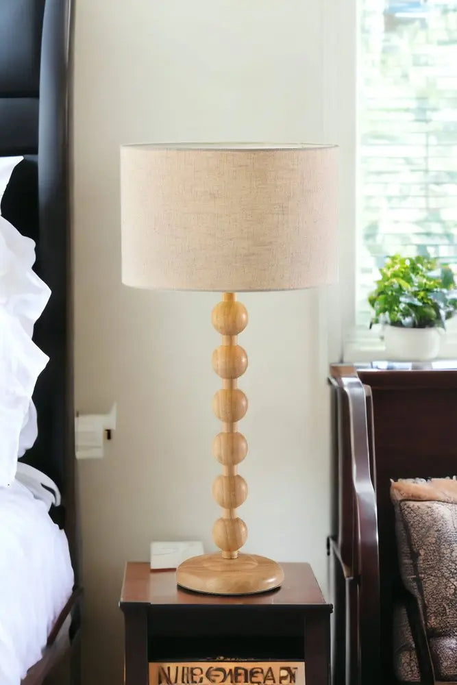 28" Brown Solid Wood Candlestick Table Lamp With Off White Drum Shade HomeRoots