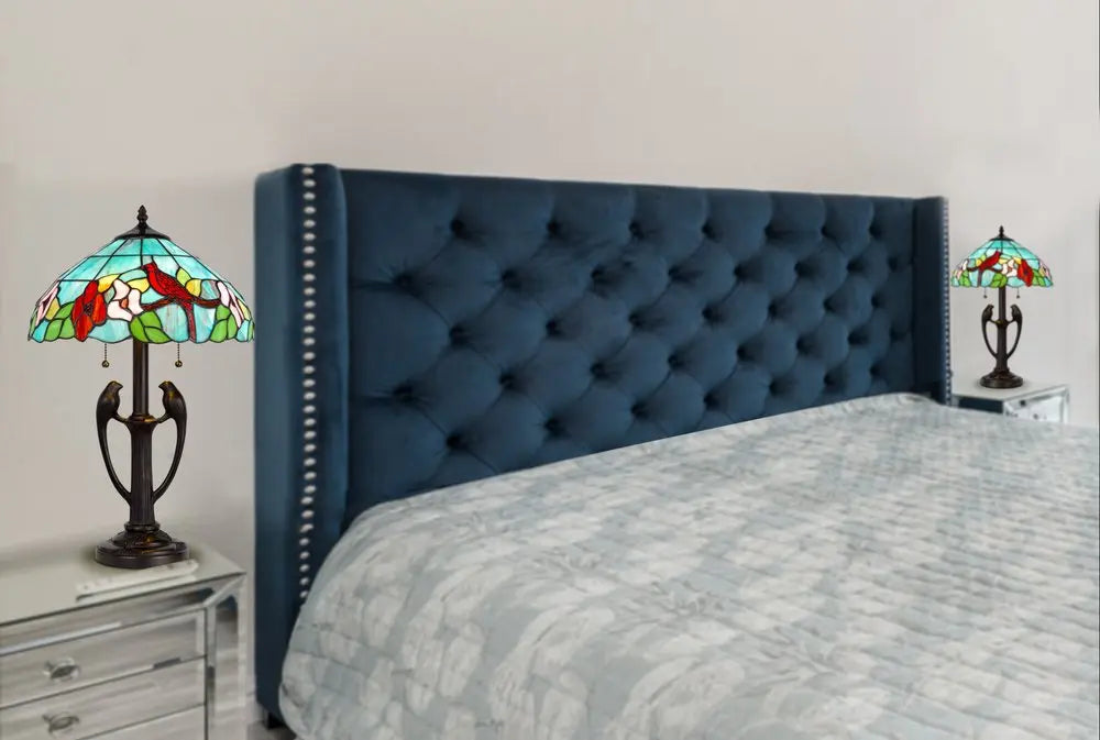 22" Bronze Two Light Tiffany Table Lamp With Aqua and Red Floral Shade HomeRoots