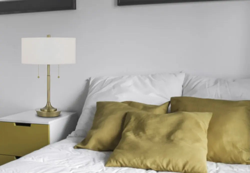 20" Antiqued Brass Metal Two Light Table Lamp With White Drum Shade HomeRoots