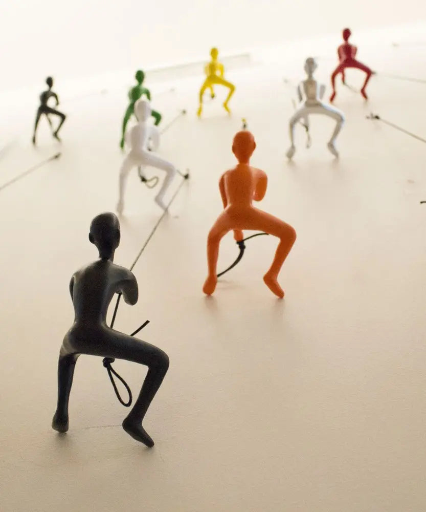 Set of Five Black Green Orange Red And White Resin Climbing Man Hanging Dimensional Sculpture HomeRoots