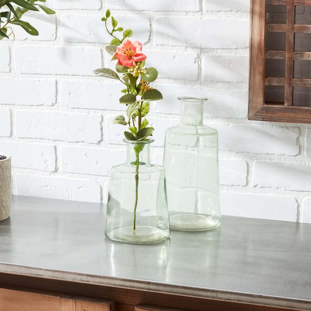 Juego de dos jarrones de mesa redondos de cristal verde