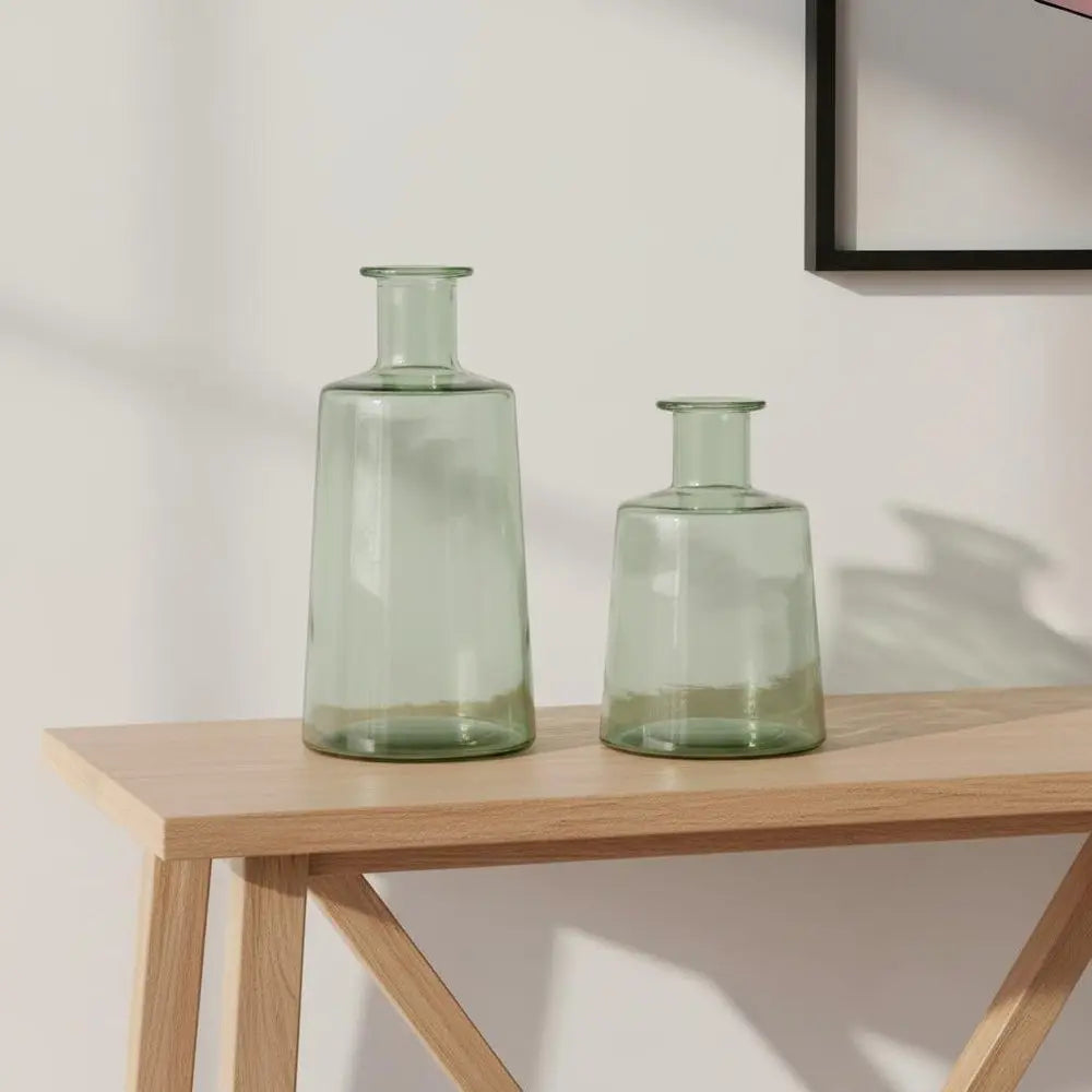 Juego de dos jarrones de mesa redondos de cristal verde