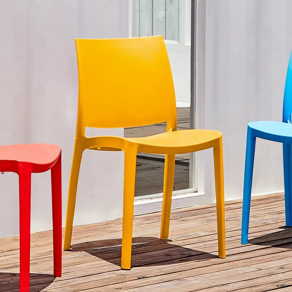Set of Four Gold Heavy Duty Plastic Outdoor Stacking Dining Chairs - NOBLE HOME INTERIORS