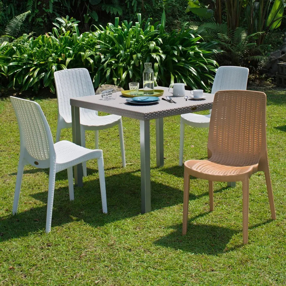 Set of Four White Heavy Duty Plastic Outdoor Stacking Dining Chairs - NOBLE HOME INTERIORS