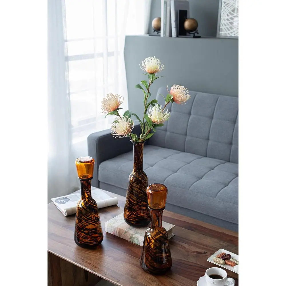 Set of Three Amber Abstract Swirl Glass Decorative Bottles With Stoppers - NOBLE HOME INTERIORS