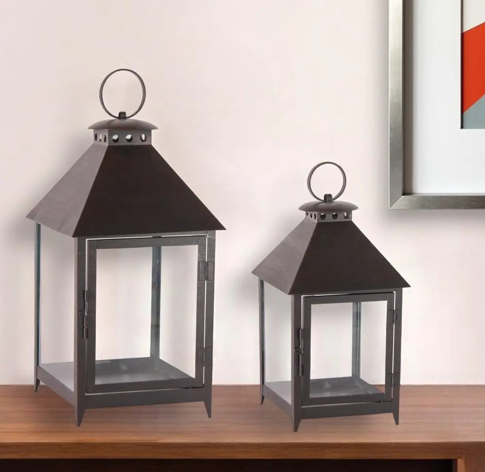 Set of Two Black Geometric Iron And Glass Floor Lantern Candle Holders - NOBLE HOME INTERIORS