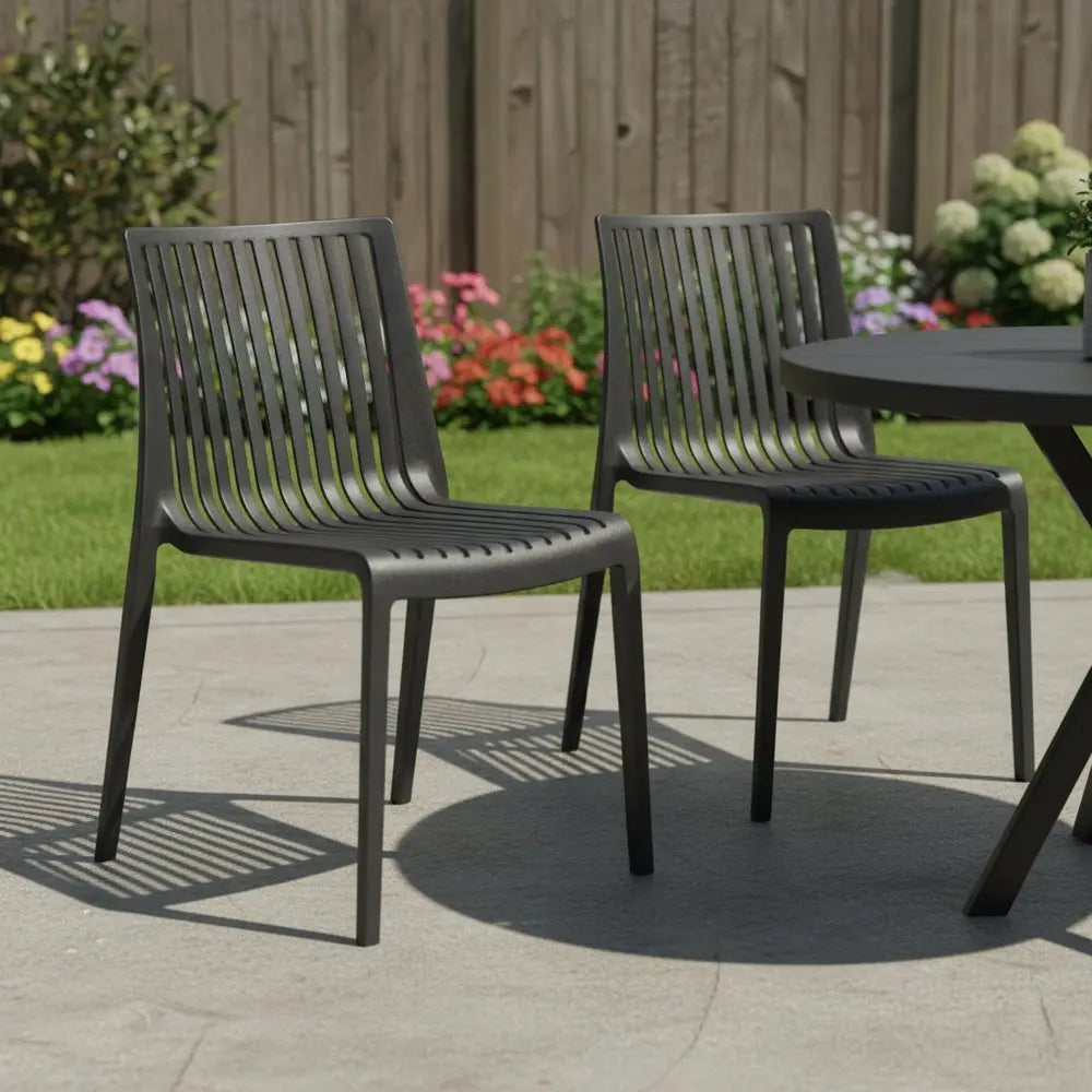 Set of Two Black Heavy Duty Plastic Outdoor Stacking Accent Chairs - NOBLE HOME INTERIORS