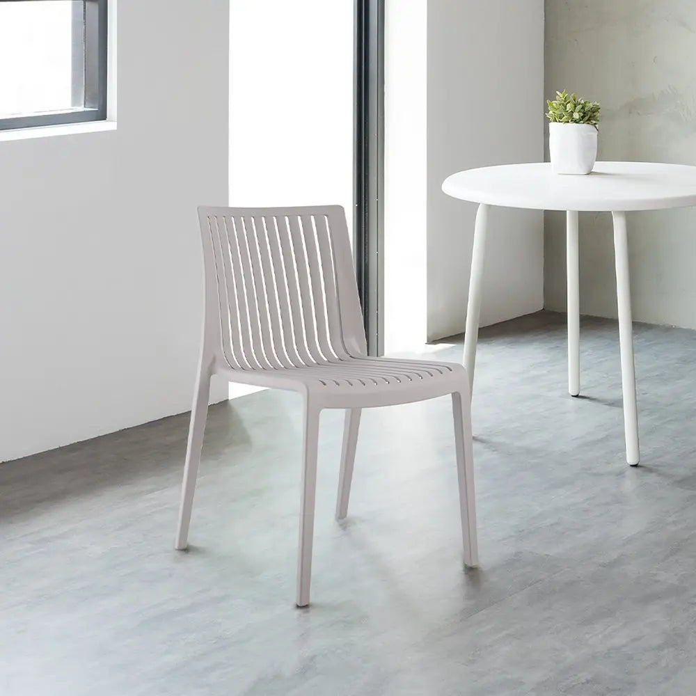 Set of Two Taupe Heavy Duty Plastic Outdoor Stacking Accent Chairs - NOBLE HOME INTERIORS