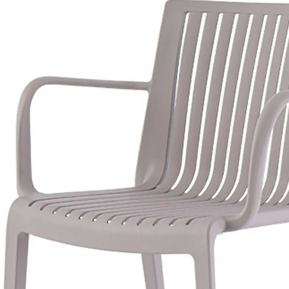 Set of Two Taupe Heavy Duty Plastic Outdoor Stacking Arm Chairs - NOBLE HOME INTERIORS