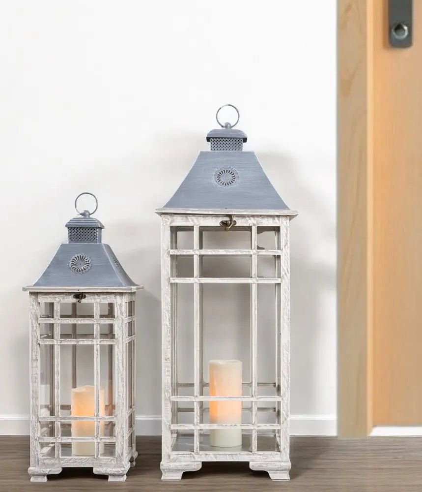 Set of Two White And Silver Distressed Geometric Metal Floor Lantern Candle Holders HomeRoots