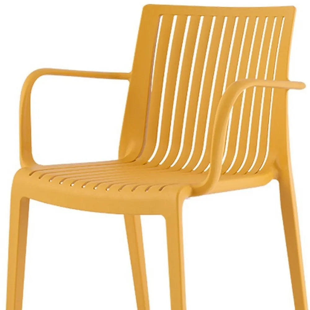 Set of Two Yellow Heavy Duty Plastic Outdoor Stacking Arm Chairs - NOBLE HOME INTERIORS